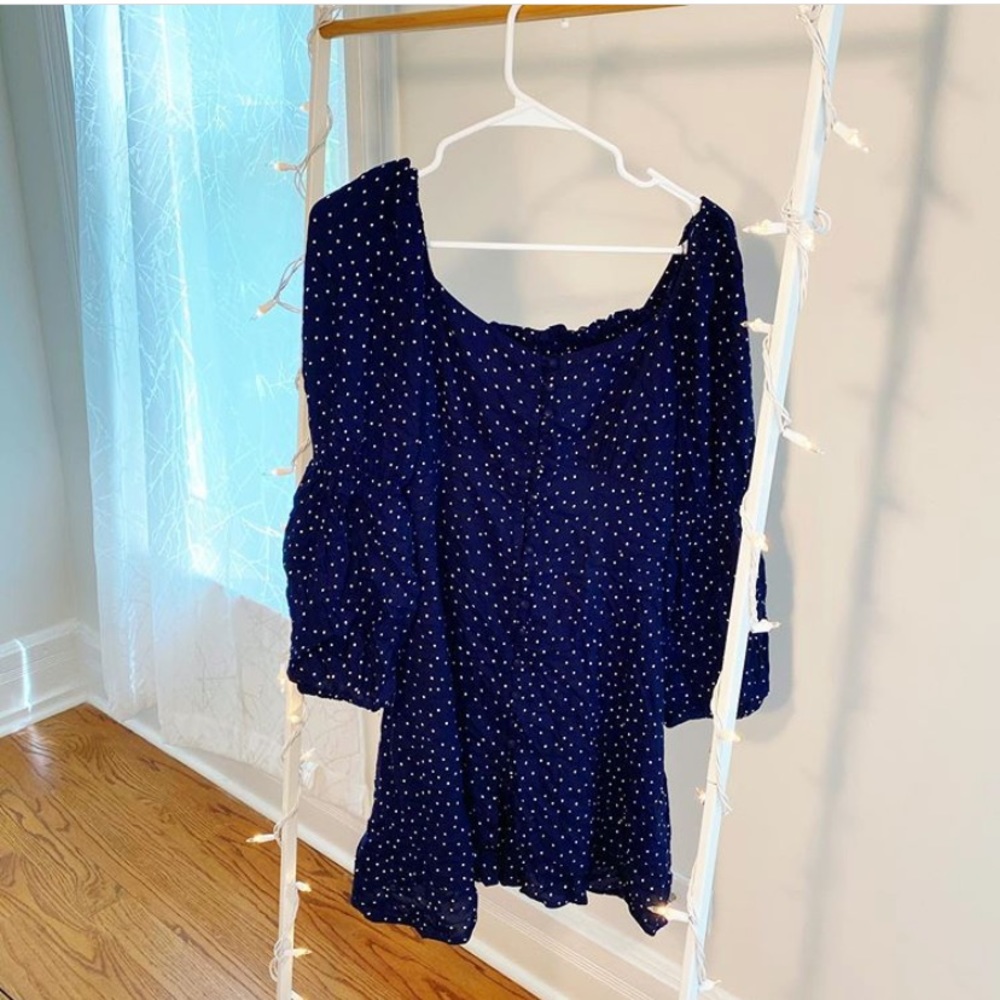 Blue and white polka dotted dress